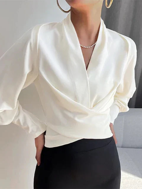 NEVINA | V-Hals Blouse met Pofmouwen en Gecentreerde Taille